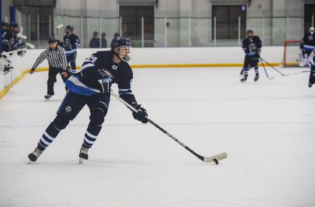 Buzek passes the puck during a Sioux Falls Power game.