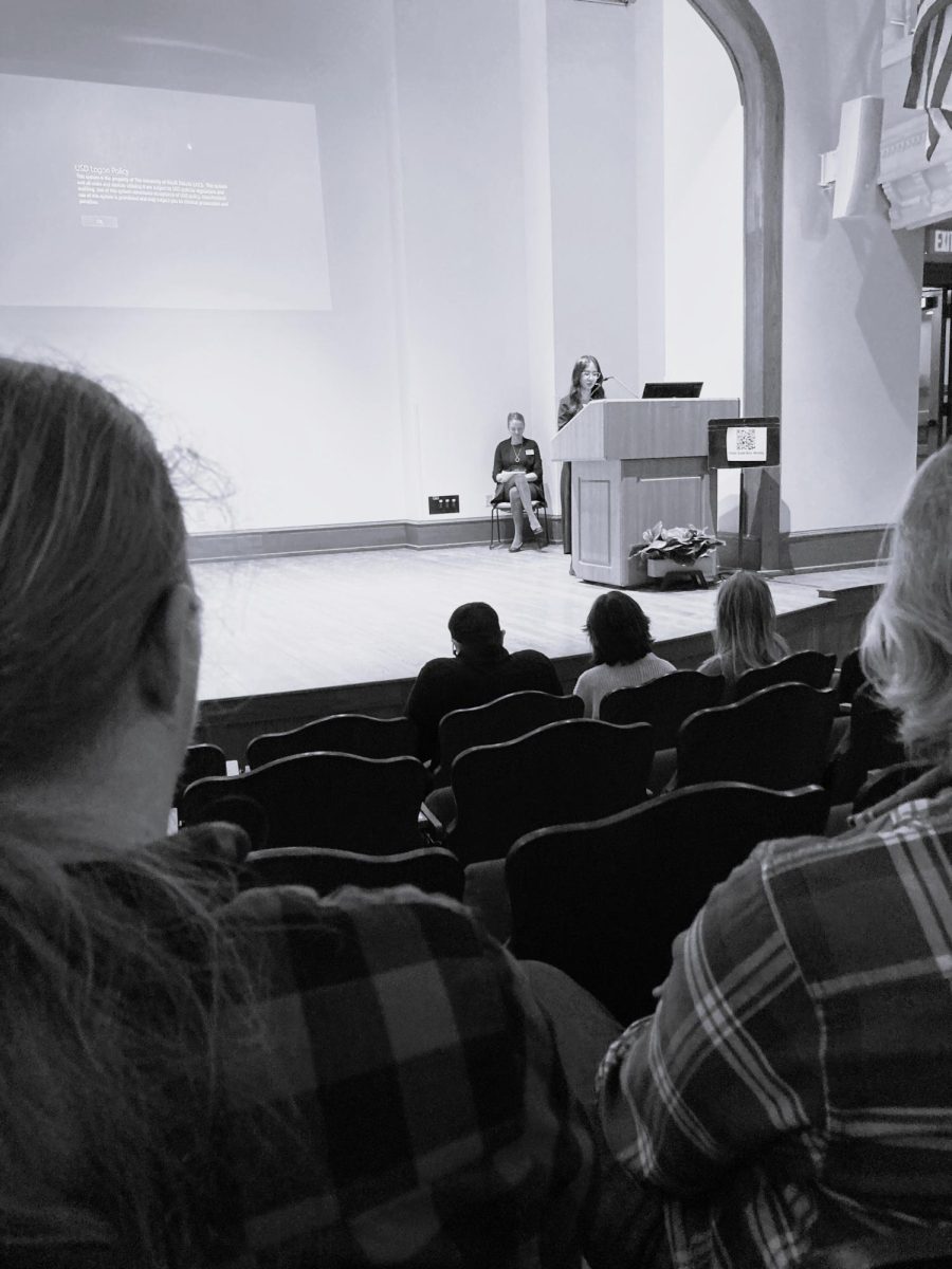 Collins presenting her gold key winning essay at USD's Farber Hall. 