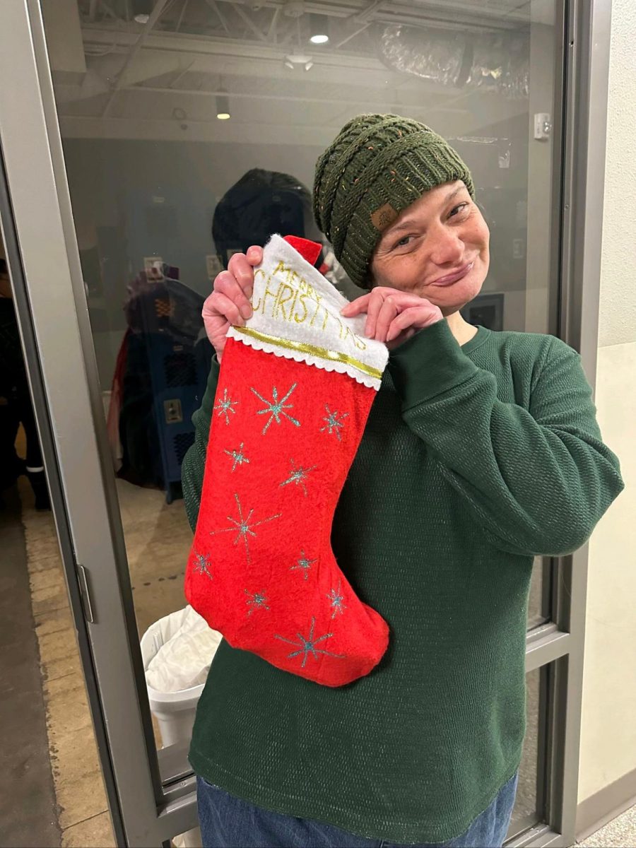 Resident receiving her stocking last year